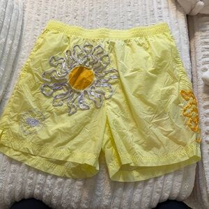 Nike Yellow Women's Athletic Shorts with Sun Design